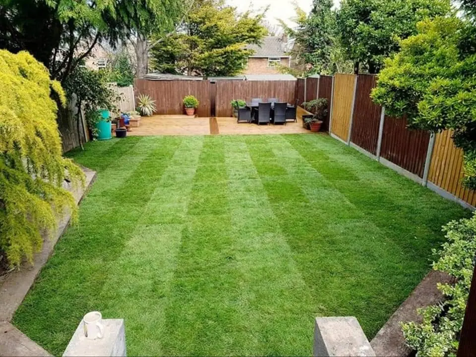 Completed striped lawn and patio area